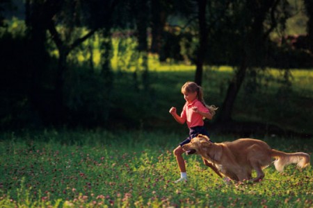 girl and dog running