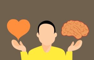 Man balancing heart and brain